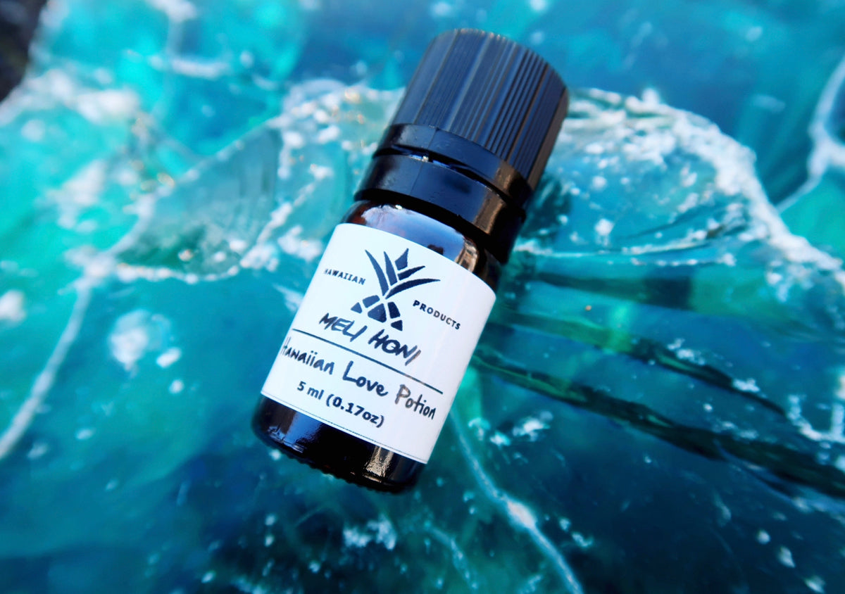 Small bottle of Meli Honi with a blue background